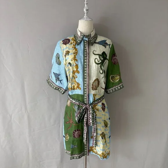 alemais bath house mini dress Alemais Bath House Mini Dress Multi Print A standout piece featuring artwork in collaboration with Sam Pauletto. With a straight mini silhouette, point collar, and a self-tie belt for the